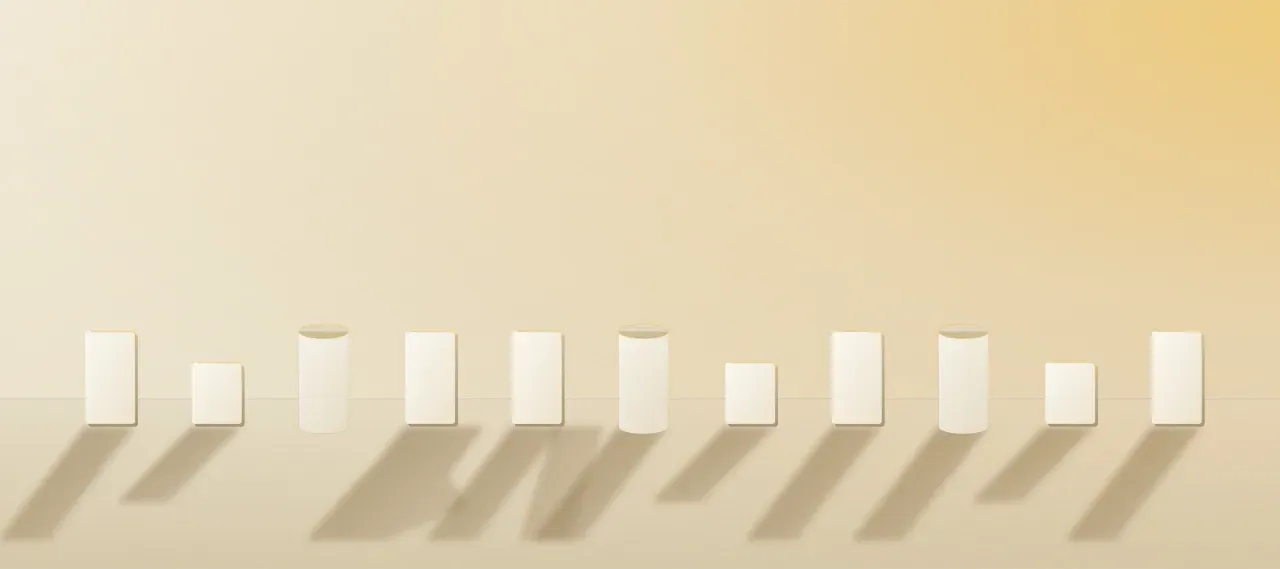 Eleven small forms in a row at golden hour. Most cast true shadows; one casts a wrong shadow, one casts two, one casts none.
